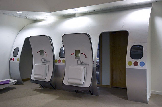 One office was transformed into a jumbo jet, fully-equipped with real airplane seats and a flight simulator.