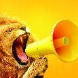 Picture of a lion roaring into a megaphone